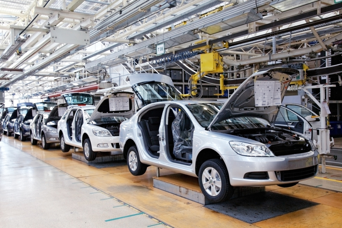 An image of volkswagen cars on an assembly line.