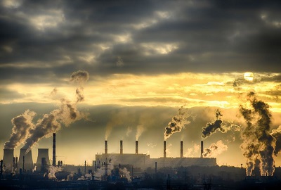 This is a photo of an industrial factory freely emitting pollution into the atmosphere.