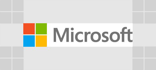 Microsoft logo containing a cube with red, green, blue and yellow quadrants next to the text Microsoft.