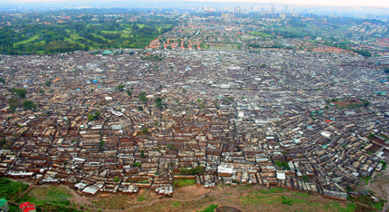 Seen from above, this photograph of Kibera shows a very crowded neighbourhood. Streets are not evident, although alleyways are.  All buildings are one or two storeys. There is no sign of government run facilities such as hospital, transit or schools.