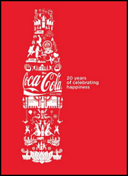 This image has a red background with a Coca Cola bottle that emerges from the background. Within the bottle are images of Coca Cola and India. To the right of the large Coca Cola logo on the bottle are the words, in white, 20 years of celebrating happiness.