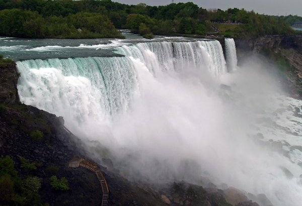 This photograph shows water rushing over Niagara Falls.