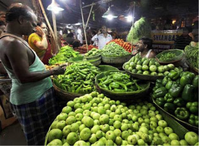 This is an image of vegetable and fruit vendors in India.