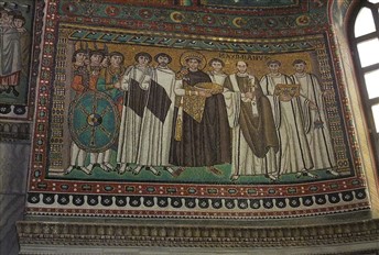 This is a photograph of a mosaic of several men in robes during Roman times.