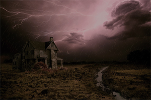 This is an image of a large colonial style house set in the distance.  All around it, lightning flashes from the dark storm in the sky above.