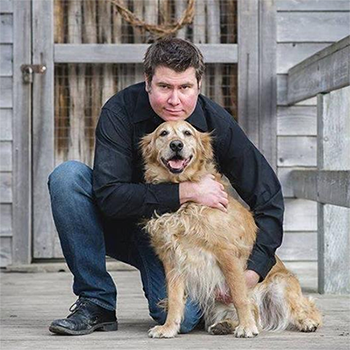 This is an image of one of the writers of EWC4U with his golden retriever named Desdemona.