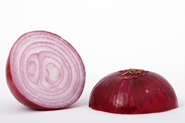 This is an image of a red onion that is cut in half and the layers inside are visible.