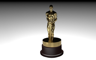 This is an image of a trophy with a golden male figure on top of the round base.