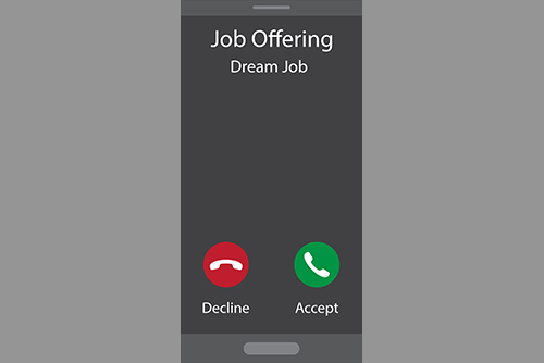 This is an image of cell phone receiving a call from a caller identified as dream job.