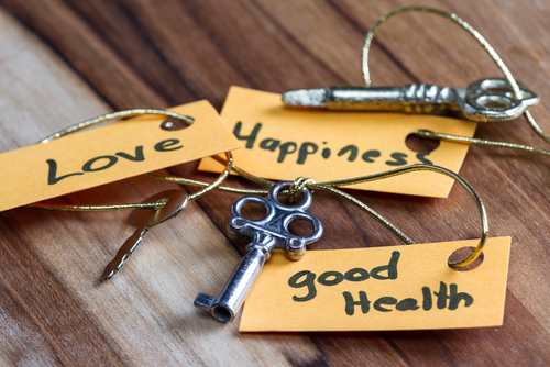 This is a set of keys with labels that read happiness, love and good health.