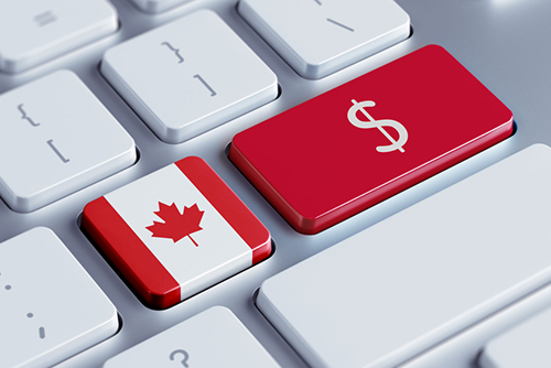 This is an image of a button on a keyboard with keys representing the Canadian flag and currency.