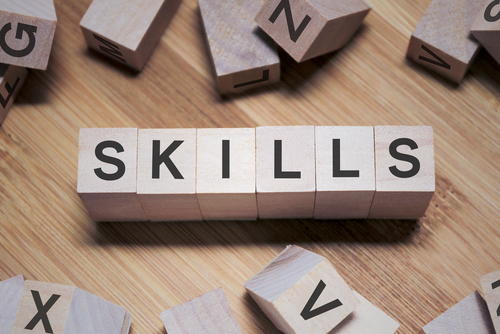 This is a series of letter blocks spelling out the word skills.