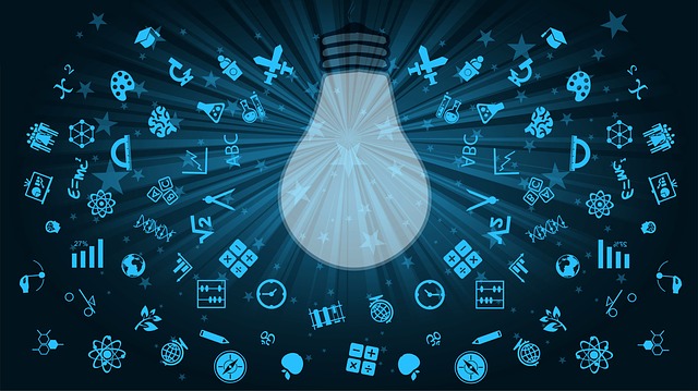 A light bulb hangs surrounded by symbols related to learning.