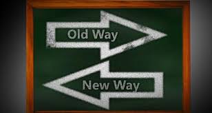 An illustration of a chalkboard with two large arrows. The one pointing right says 'old way' on it and the one pointing left says 'new way.'