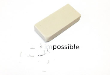 This is an image of a white eraser, which has rubbed out the letters 'im' and left 'possible'.