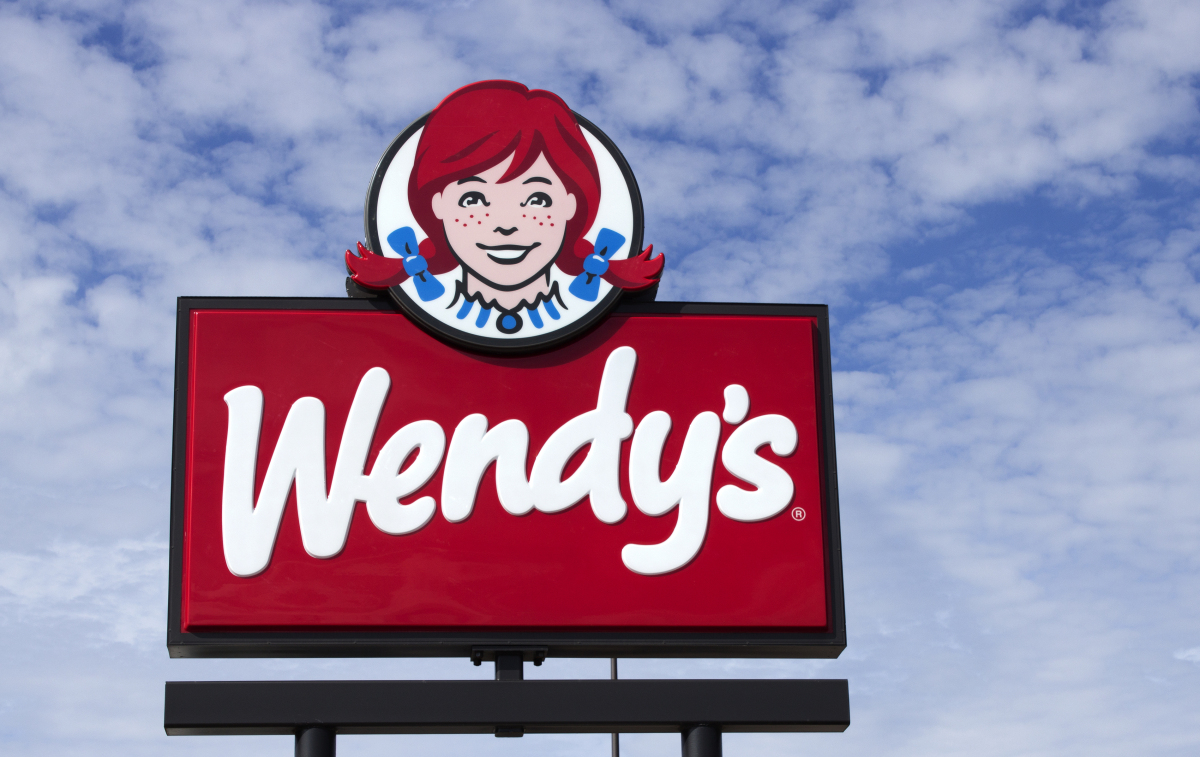 This image is the iconic red-headed girl in braids that the restaurant chain Wendy’s uses for its advertising. The design of her collar spells out the word Mom.