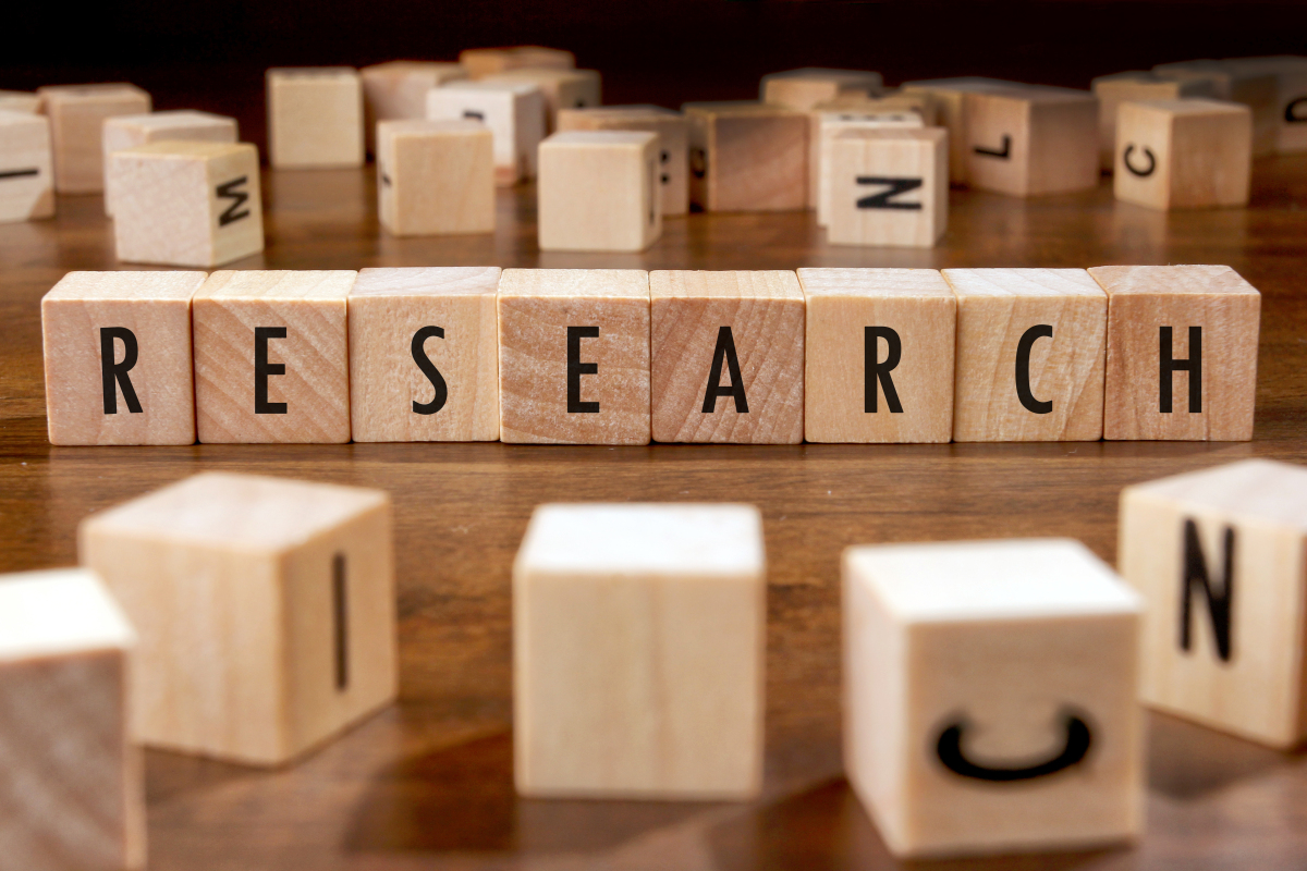  This image is a photograph which shows a series of blocks spelling out the word RESEARCH.