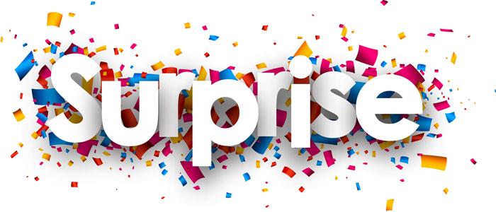 This is an image of the word, “surprise,” surrounded by streamers.