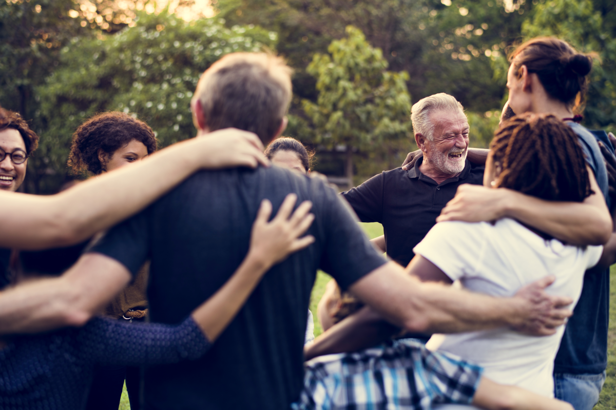 This is an image of people in a group hug.