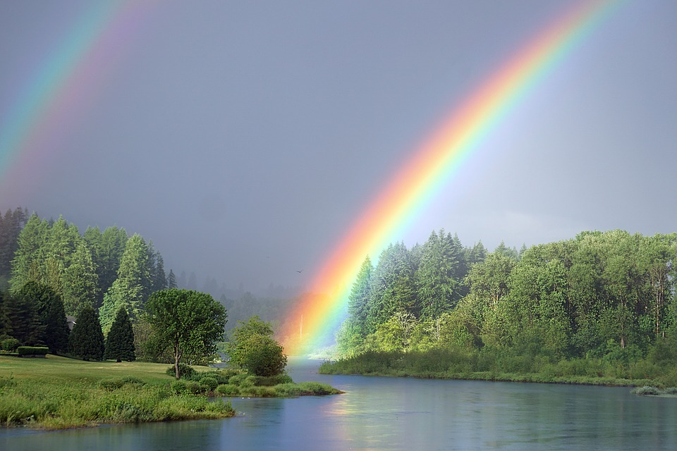 This is an image of a rainbow in the sky.