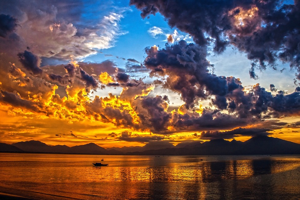 This is an image of a amber-coloured sunset in Da Nang Bay, Vietnam.