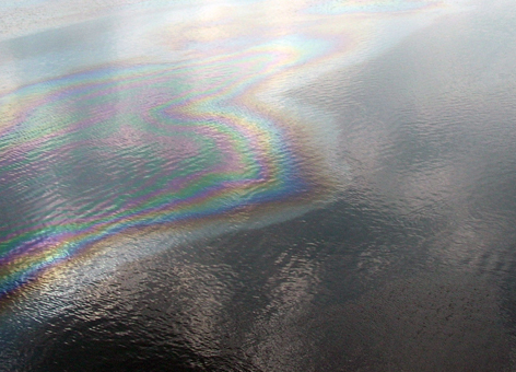 This is an image of an oil slick rainbow on water.