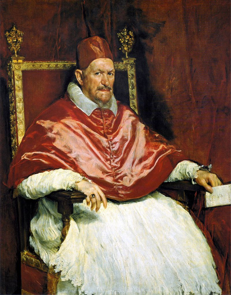 This is an image of two portraits of Pope Innocent the Tenth. The version made in the 1600s is highly realistic, while the one made in 1953 is roughly painted and the face looks like a screaming wraith.