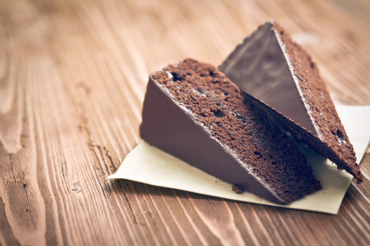 This is an image of two slices of chocolate cake.