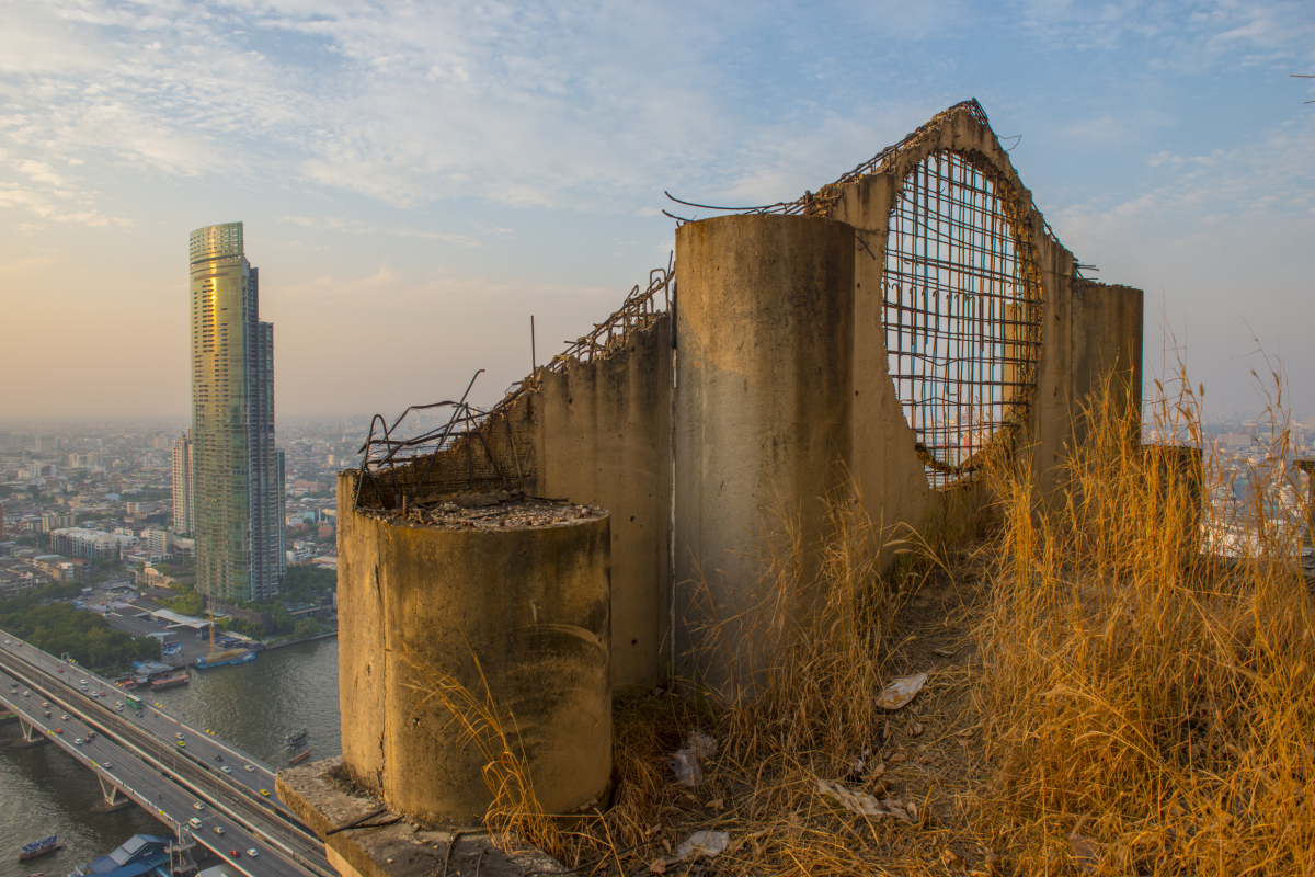 This is an image of two cities; one futuristic, and the other in ruin.
