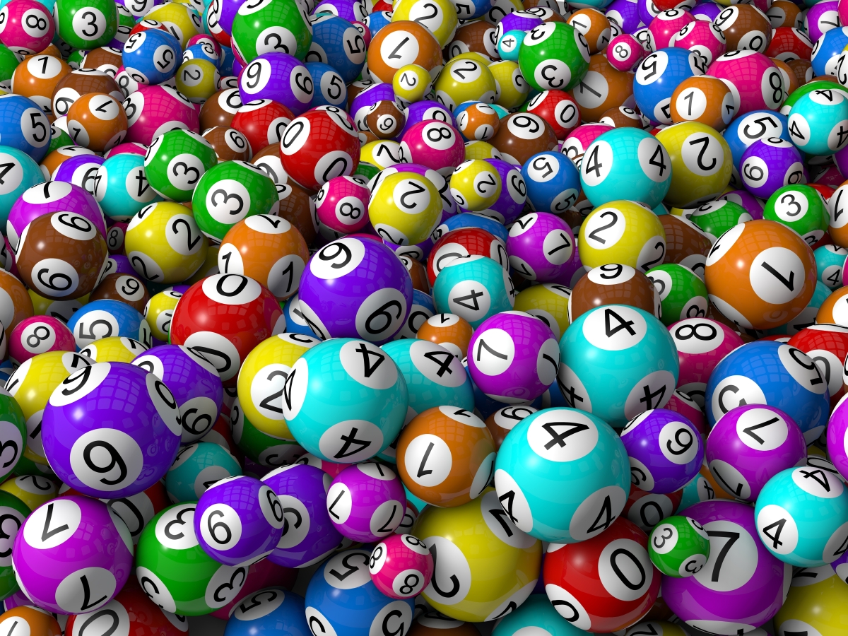 This is an image of random lottery balls of different sizes and colours.