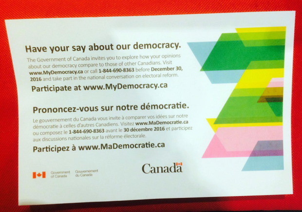 This is an image of the postcard from the Canadian government inviting people to fill out a survey regarding democracy.