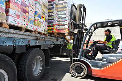 This is an image of a worker operating a forklift.