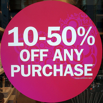 This is an image of a sale sign advertising 10 to 50 percent off.