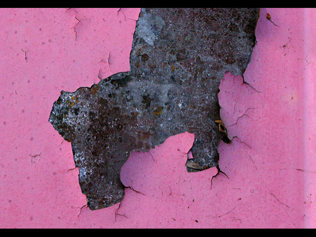 This is an image of a rust spot on a car.