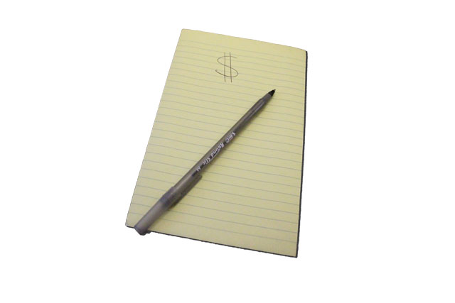 This is an image of a notepad with a dollar sign on it.