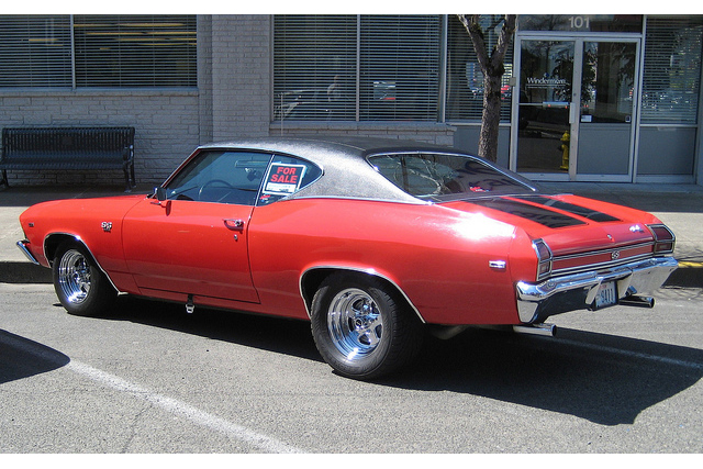 This is an image of a vehicle with a for sale sign in the window.