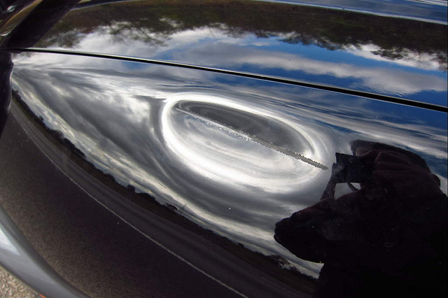 This is an image of the dented panel of a car.