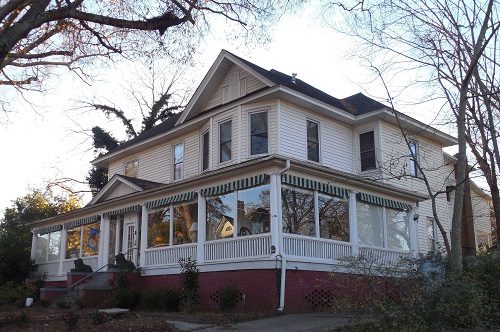 An image of a house whose rooms would be divided up for each guest.
