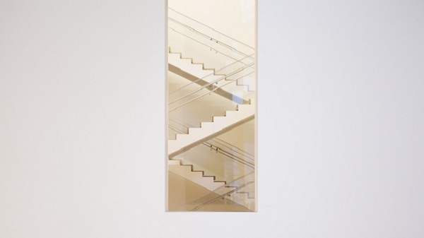 An image of a staircase from outside of a building.