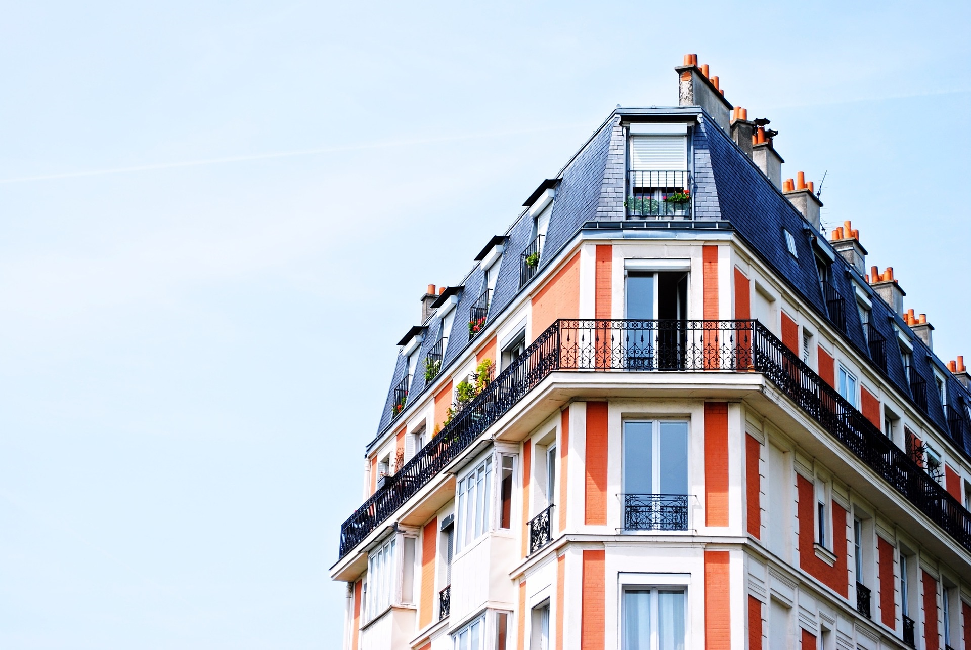 An image of an apartment building with balconies.