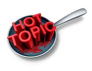 This is a picture of a frying pan. The words “HOT TOPIC” are written in red capital letters and they appear to be melting.