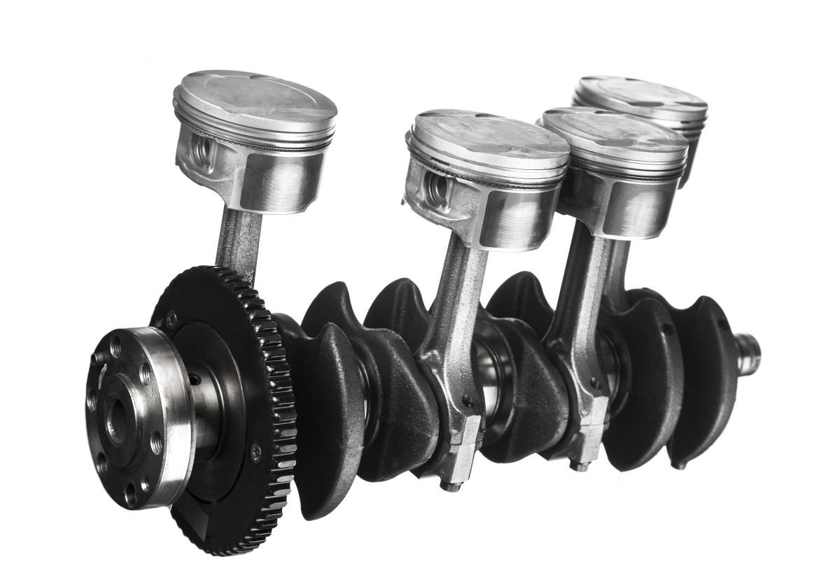This image depicts a crankshaft attached to four pistons.