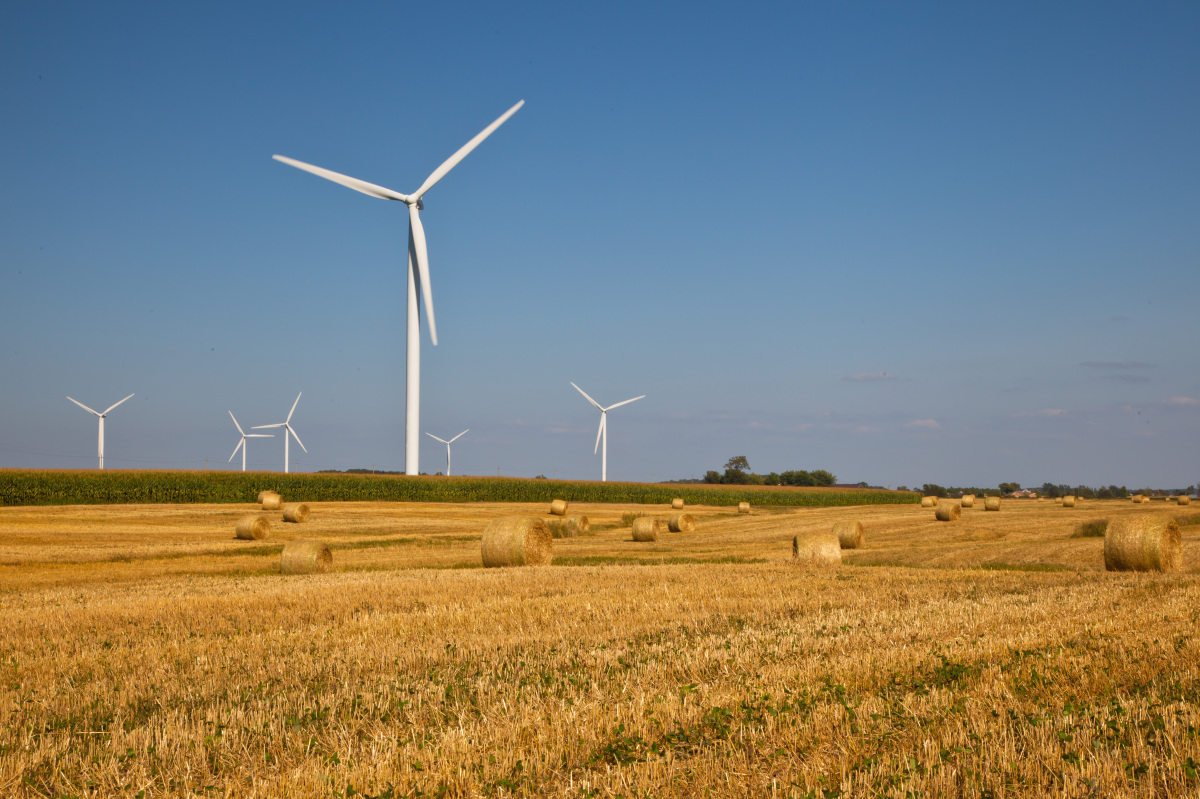 This image depicts a schematic of six wind turbines on farmers fields.