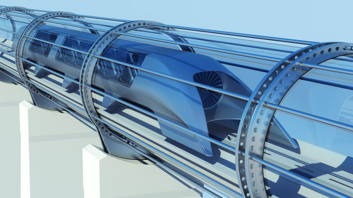 This image depicts a proposed hyperloop transportation system using a passenger capsule inside a glass tube