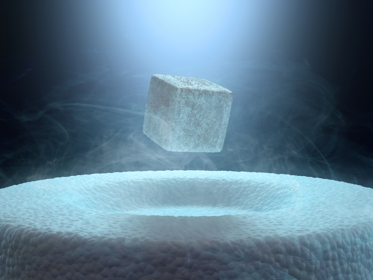 This image depicts a magnet levitating above a superconductor.